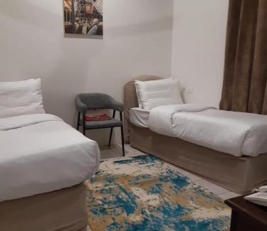Mecca Haus | مكة المكرمة غرف عائلية فندق بجوار الحرم تخفيضات للمجموعات ناحية برج الساعة Makkah room in HOTEL near ALHARAM Multiple ROOM
