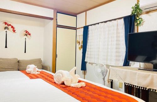 Shin-Osaka Wohnung | 大阪梅田淀川花民宿家庭房b套