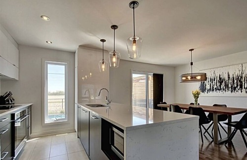 Carignan Haus | 15 min from dix-30, close to Montreal, quiet area with heated inground pool.