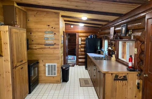 Bigfork Haus | 1920 Montana Quiet Log Cabin! Creek, fire pit, 10 ac. of wilderness/ Swan Valley