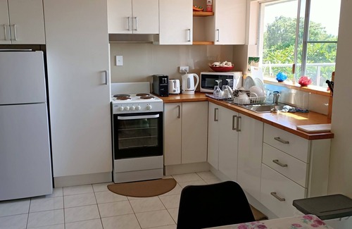 South Mission Wohnung | Apartamento de 2 dormitorios con excelentes vistas del mar de Coral y las islas.