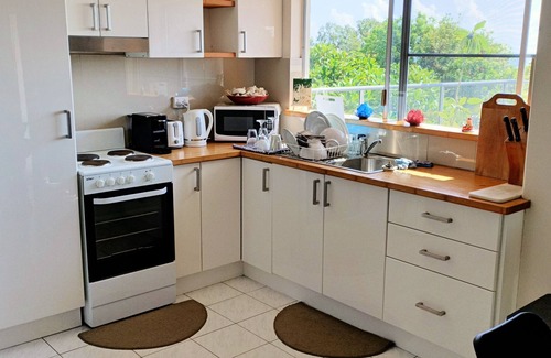 South Mission Wohnung | Apartamento de 2 dormitorios con excelentes vistas del mar de Coral y las islas.