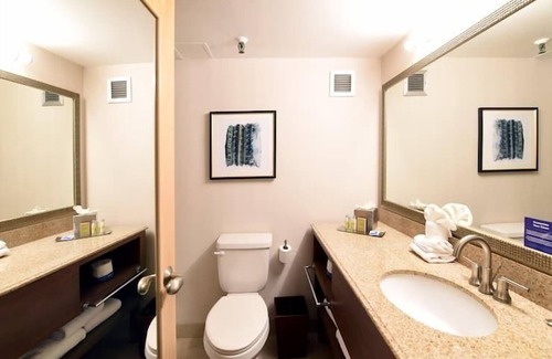 Tucson Haus | 2 Connecting Suites with Three Beds at a Full Service Hotel by Suiteness
