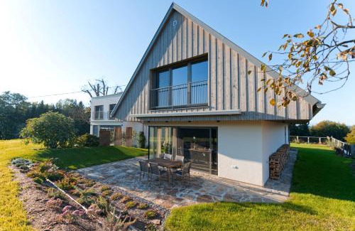Eibiswald Haus | 2 stilvolle Ferienhäuser Südsteiermark ruhige Lage top Aussicht & Wallbox
