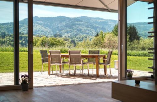 Eibiswald Haus | 2 stilvolle Ferienhäuser Südsteiermark ruhige Lage top Aussicht & Wallbox