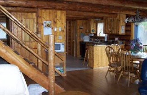 Condon Haus | 2 Story Log Home, on a Swan River near Mission Mountain Wilderness Views