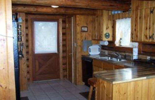 Condon Haus | 2 Story Log Home, on a Swan River near Mission Mountain Wilderness Views
