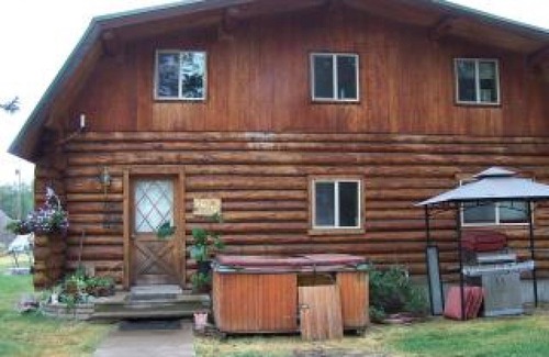 Condon Haus | 2 Story Log Home, on a Swan River near Mission Mountain Wilderness Views