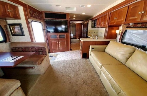 Columbiana Haus | 2011 Winnebago Adventurer 35P - Unit Rental / NO site