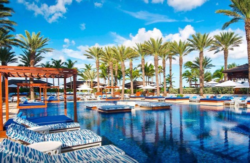 Paradise Island Eigentumswohnung | 2BR Oceanfront Suite – The Reef Atlantis, Full Kitchen & Balcony Sleeps 9