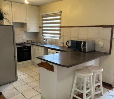 Die Hoewes Wohnung | 2c - 4 No load shedding 2bed 2bath with garden