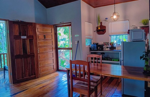 San Ignacio Haus | 3 Family Cottages -7 beds~AC~ Screened balcony~ Breakfast and dinner onsite.