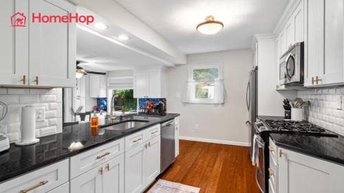 Euclid Haus | 4 Bedroom Pool and Hot Tub Home Near Cleveland