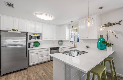 Clipper Cove Haus | Gerade renoviert! 4 min zum Strand - neben dem Pool - toller Wohnbereich im Freien ..