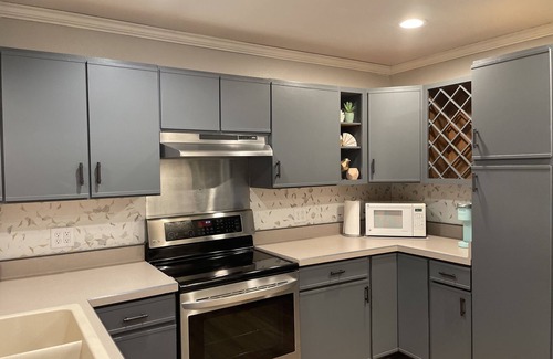 Village of Pewaukee Haus | 4 minutes walk to beach from this charming home with a lake view!