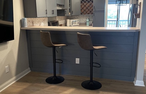 Village of Pewaukee Haus | 4 minutes walk to beach from this charming home with a lake view!