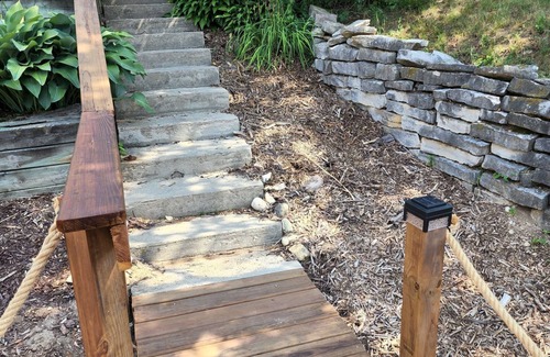 Village of Pewaukee Haus | 4 minutes walk to beach from this charming home with a lake view!