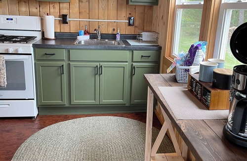 East Tawas Haus | 5 minutes from Downtown East Tawas, On The Rocks is a cottage on Lake Huron