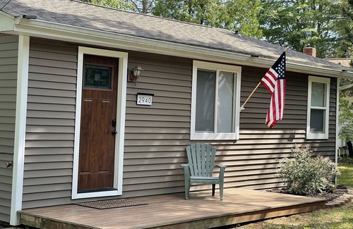 East Tawas Haus | 5 minutes from Downtown East Tawas, On The Rocks is a cottage on Lake Huron