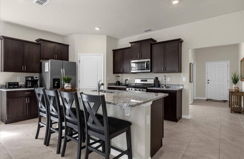 Sunridge Woods Haus | 6 Bedroom/ 5.5 Bathroom/ Solterra (7664 OL)