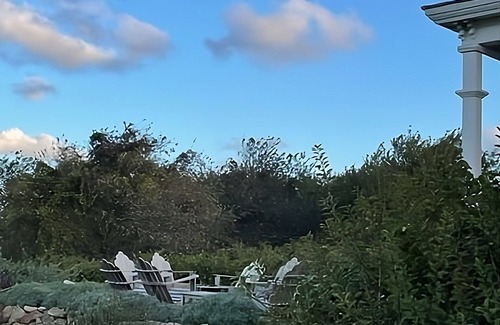 New Shoreham Haus | A Block Island landmark with historic charm, gardens, long water views