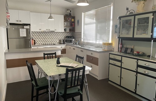 Greenways Landing Haus | A Modern/Retro styled home with a fun black Cat theme.