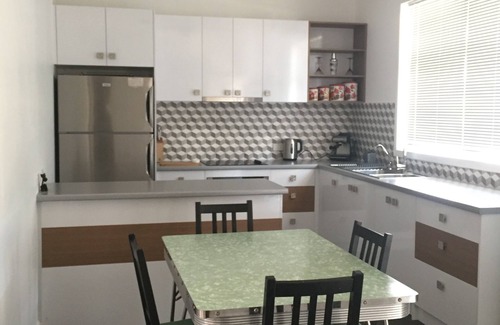 Greenways Landing Haus | A Modern/Retro styled home with a fun black Cat theme.