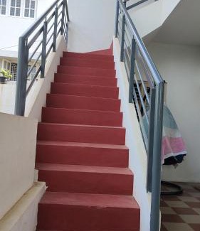 Vijayanagar Haus | A spacious AC room with wide Balcony -Karimbumel House a perfect place for yoga practicioners
