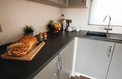 Barmston Hütte | A superior lodge 3 that sleeps 8 guests in 3 bedrooms