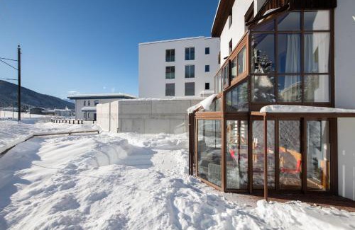 Davos Wohnung | Agrimonia - 5,5-Zi Duplex Wohnung bis 11 Personen mit eigenem Garten