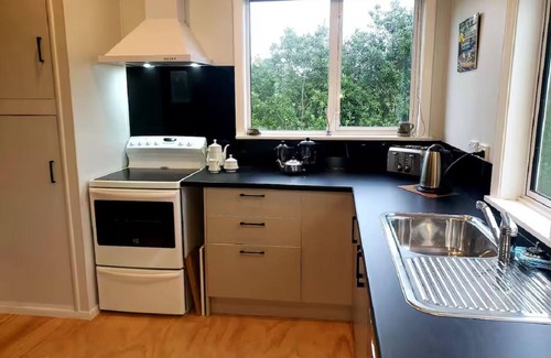 Lake Ferry Hütte | Amazing recently renovated cozy cottage, oozing both character and comfort.