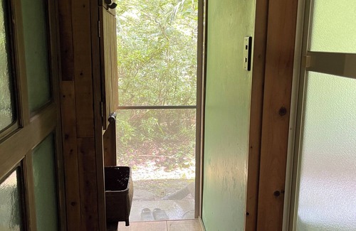 Matsusaka Haus | An old house with a spacious kitchen surrounded by mountains and clear streams