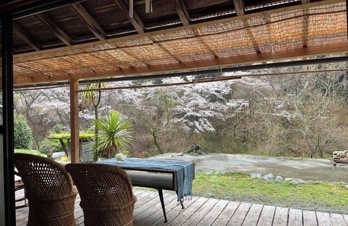 Matsusaka Haus | An old house with a spacious kitchen surrounded by mountains and clear streams