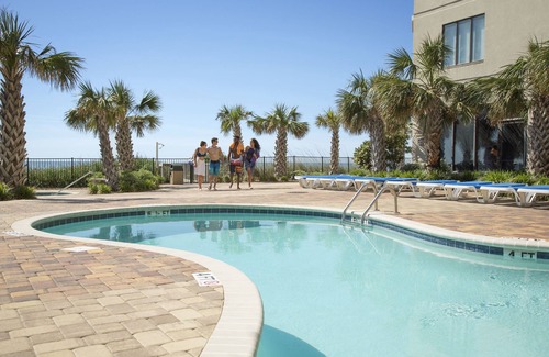 Myrtle Beach Resort | Angle Oceanfront Sun Suite mit Balkon und offiziellen Vor-Ort-Vermietungsrechten