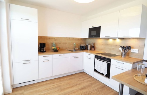 Tossens Wohnung | Ankerhuus - enjoy nature on the dyke. Sauna. Fireplace. Terrace.