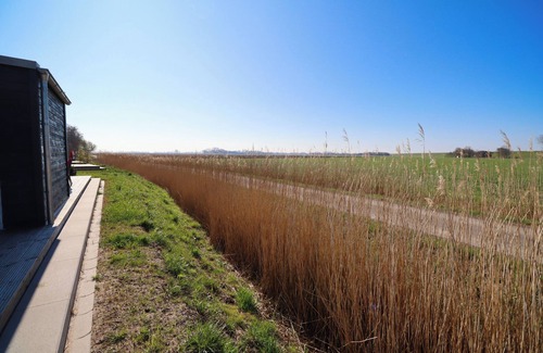 Tossens Wohnung | Ankerhuus - enjoy nature on the dyke. Sauna. Fireplace. Terrace.