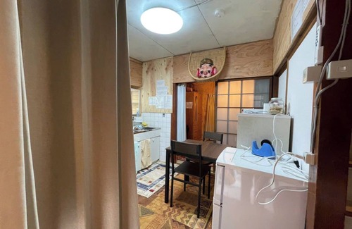 Toyonaka Haus | AnNam Stay NEW HOTARUGAIKE: 15 minute walk to Osaka Airport (Itami Airport)! 15 minutes to Umeda by train! Two-story, one-group townhouse.