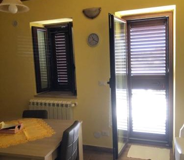 Basico Haus | Basicò un balcone sul mare-Casa I CARRUGGI- Case vacanza Sicilia&Toscana-
