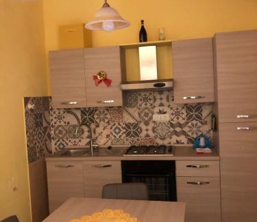 Basico Haus | Basicò un balcone sul mare-Casa I CARRUGGI- Case vacanza Sicilia&Toscana-