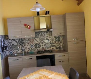 Basico Haus | Basicò un balcone sul mare-Casa I CARRUGGI- Case vacanza Sicilia&Toscana-