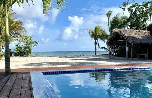 Caribbean Way Villa | Beachfront Home w/ Pool, Volleyball & Rooftop View