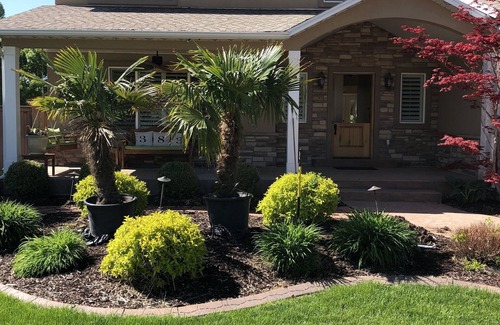 River Bottoms Haus | Beachy Home in Provo. Large deck with builtin hot tub, Fire pit, Palapa