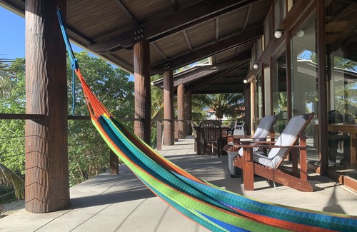 Placencia Haus | Schöne Beachfront Island Home, privaten Dock, Village Transport Inclu
