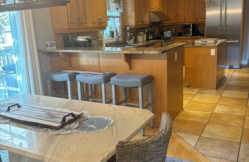 Oak Bluffs Haus | Beautiful Estate with salt water pool & pond with kayaks