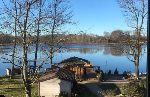 Grand Junction Haus | Beautiful Lake Home with Tiki Bar for EXTRA FUN Home is governed by Ordinance