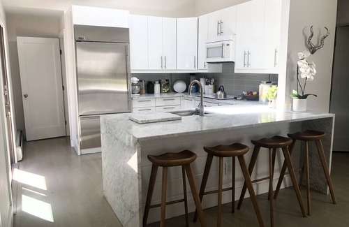 Clearwater Beach Haus | Beautiful modern beach house with swimming pool. 3 minutes from bay beaches.