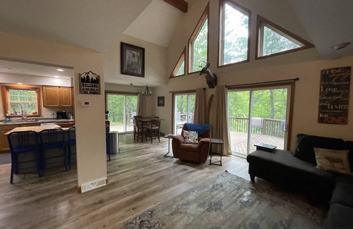 Muskegon Haus | Beautiful private getaway in updated Cape Cod style home on the river.