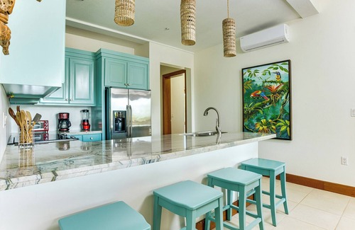 Cocoplum Eigentumswohnung | Belizean Aquamarine Dream Oceanfront Condo