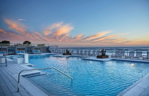 East Daytona Hotel | Best Place to Unwind! Beachfront Property w/ Outdoor Pool, Pets Allowed