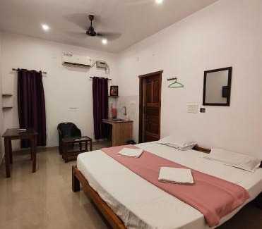 Auroville Haus | Blissful Haven 卂尺ㄒCafe- Guest House